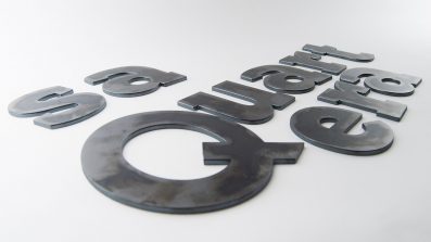 Corporeo cortado por Laser Mallorca en hierro negro para Sa Quartera.